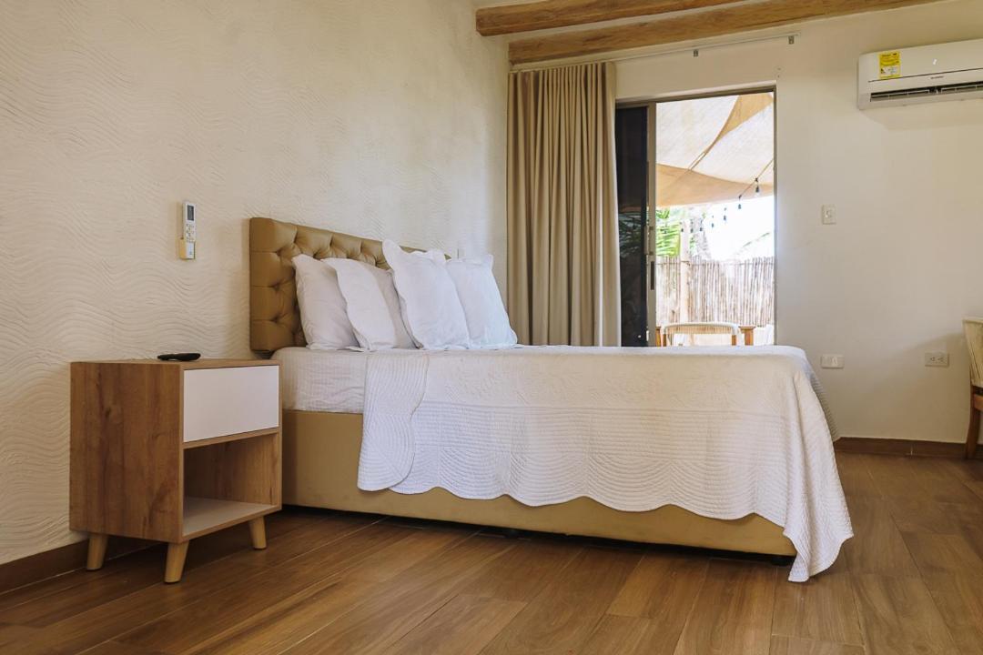 Palmarito Beach Hotel เตียราบอมบา ภายนอก รูปภาพ